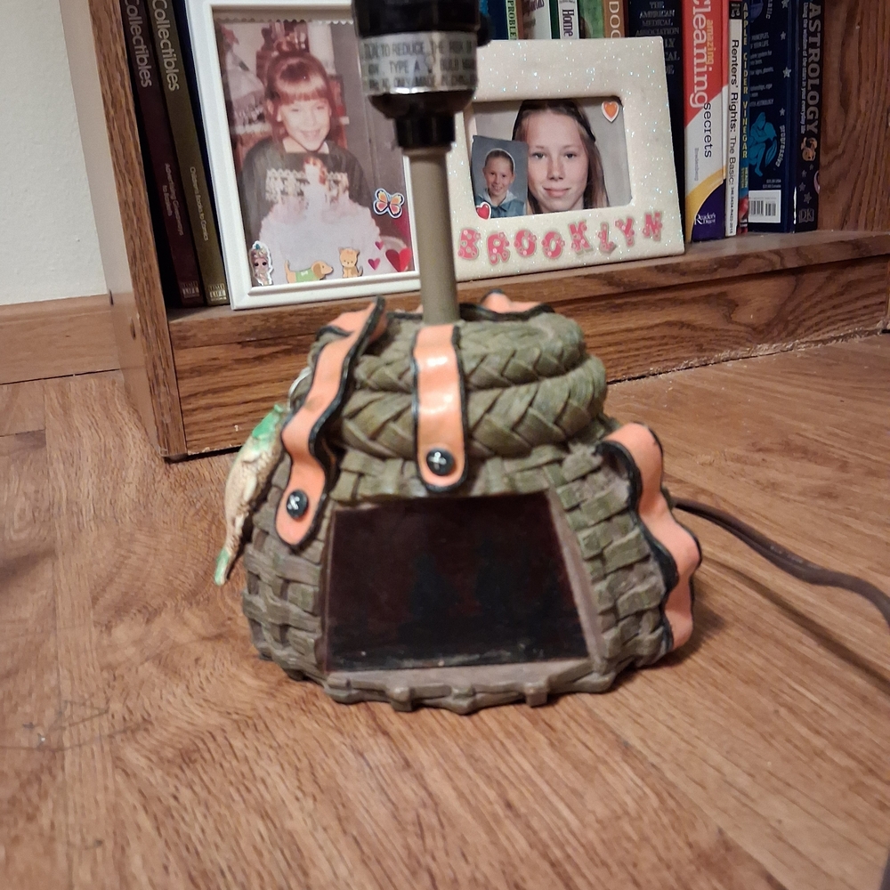 This Is A Vintage Table Lamp Themed Around Fishing